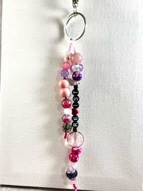 Pink and purple “resist” keychain or bag charm